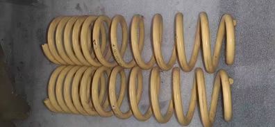 Pareja de muelles traseros nuevos marca apex amarillos para audi 80.